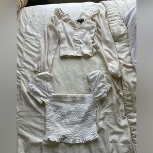 Two white tops one long sleeve one short sleeve